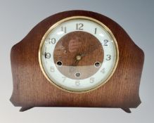 An early 20th century oak mantel clock.