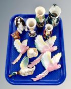 A tray of ceramic flying parrot ornaments, duck plaque, Nao figure of a child, character jugs etc.