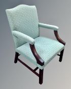 A Gainsborough style mahogany armchair in green fabric