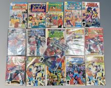 A collection of comics including Archie, Judge Dredd and Marvel's Transformers issues.