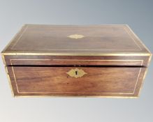 A 19th century mahogany brass bound writing box.