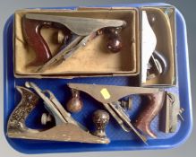 A tray containing woodworking planes, finger plane no. 75, record no. 0120 plane in box.