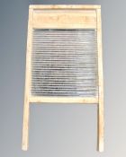 A pine and glass washboard.