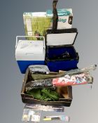 A large collection of fishing equipment including fishing barrow, landing net, waders (size 44/45),