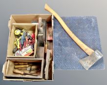 A box of tools, vintage axe, wood plane,