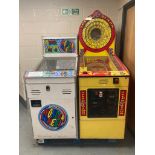Two coin operated arcade machines - Speed Demon & Wonder Wheel.