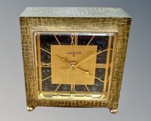 A Luxor alarm bedside clock in textured brass case, height 6.
