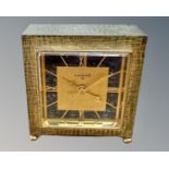 A Luxor alarm bedside clock in textured brass case, height 6.