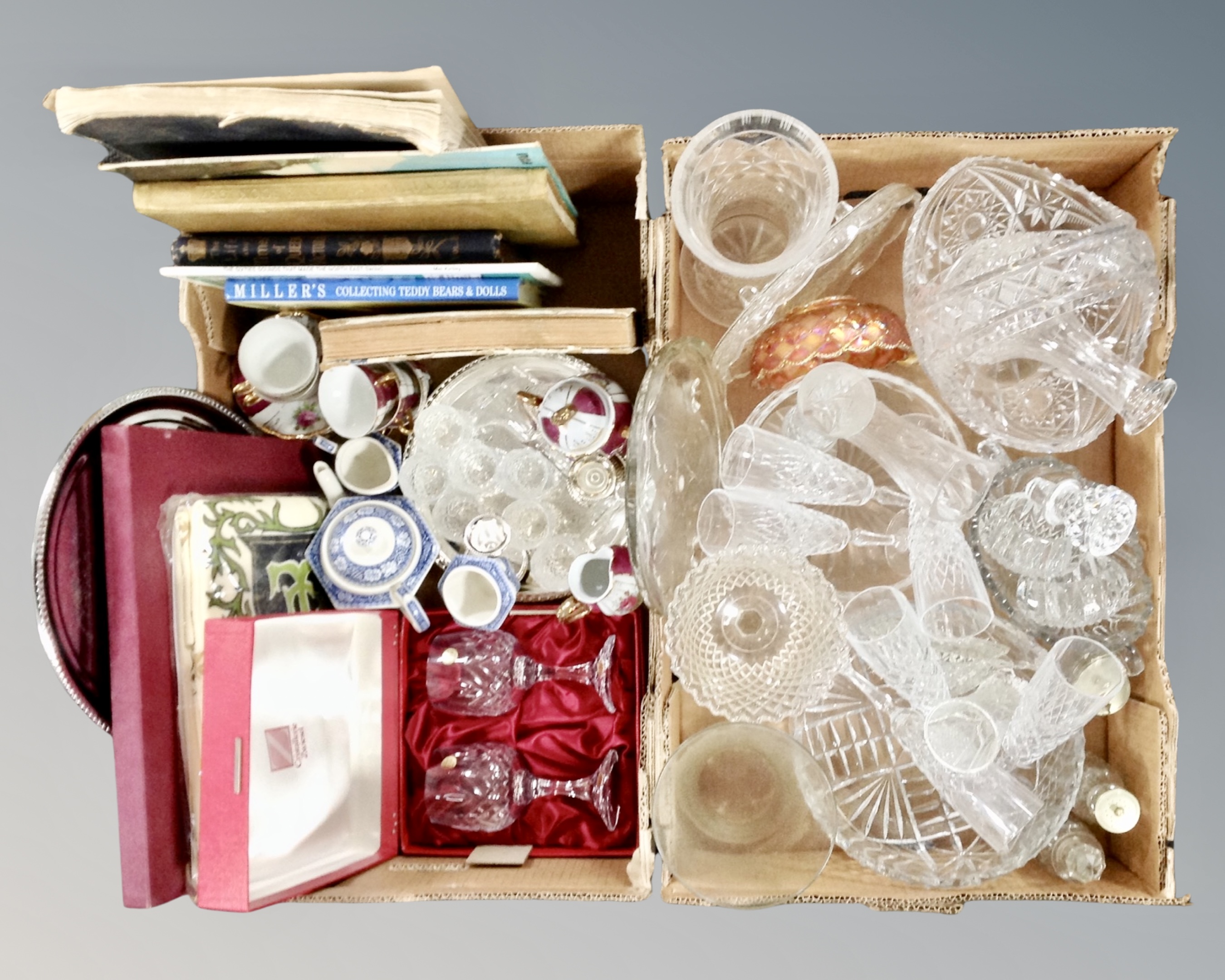 Two boxes of assorted glass ware, plated trays,