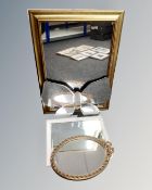 A contemporary gilt mirror together with a frameless butterfly mirror and two further mirrors