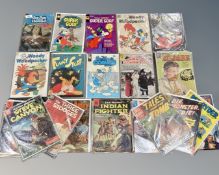 A collection of Whitman and Dell comics including The Fox and the Hound, Woody Woodpecker,