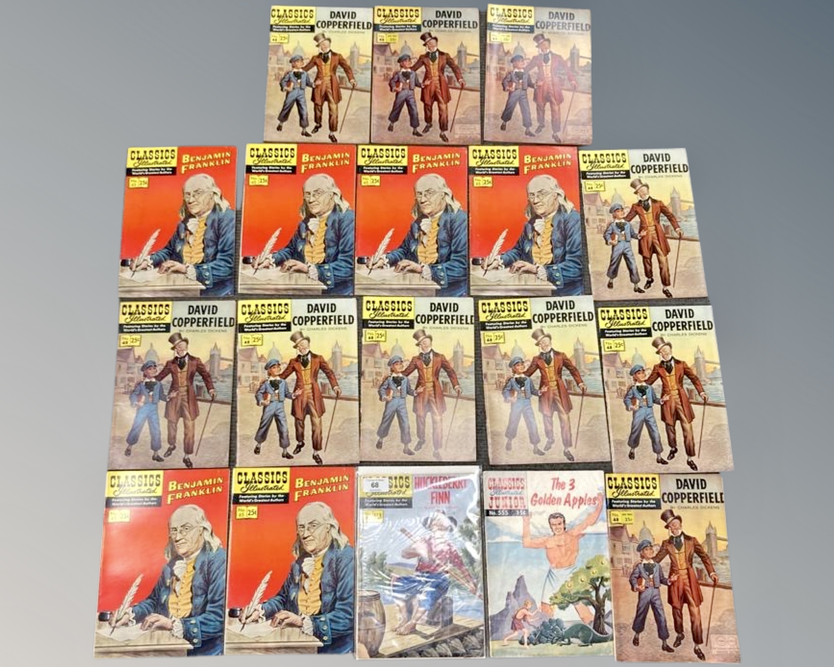 A collection of Classics Illustrated comics including David Copperfield, Huckleberry Finn,