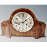 An early 20th century walnut mantel clock.
