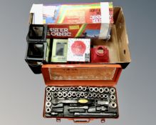 A box containing a socket set, car jack, a pair of lamps etc.