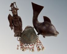 A large Eastern bronze figure of a warrior together with a fish figure and a flask.