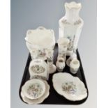 A tray of Aynsley Wild Tudor pattern ceramics including vase, mantel clock,