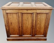 A panelled oak blanket box (width 108cm)