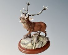 A Border Fine Arts figure, Red Stag, on plinth.