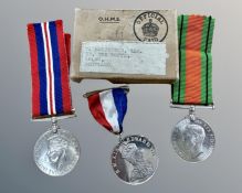 A WWII medal pair comprising Defence Medal and 1939-45 Medal,