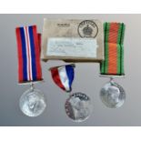 A WWII medal pair comprising Defence Medal and 1939-45 Medal,