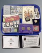 A collection of coins, commemorative issues, penny blank stamp issued by the Westminster collection,