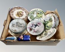 A box containing ceramic collector's plates, Wedgwood and Bradford exchange editions etc.