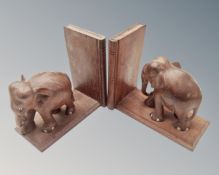 A pair of wooden elephant bookends.
