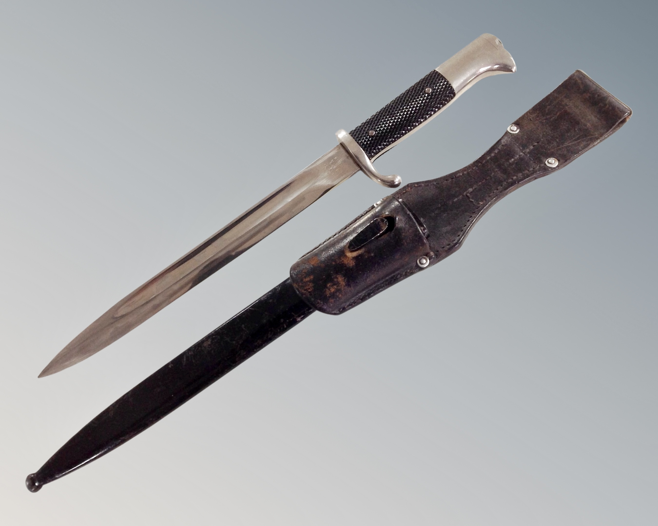 A World War Two Alcoso Solingen bayonet in sheath.