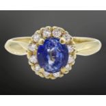 A sapphire and diamond cluster ring,