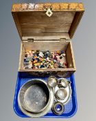 A miniature camphor wood box containing beads and buttons,