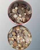 A tin containing antique and later copper and other coins including English and European examples.