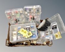 A box of fly making equipment, plastic cases containing threads, line,