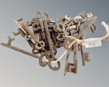 A collection of antique steel keys.