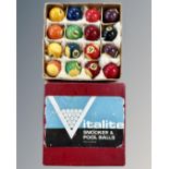 A vintage box of Italite pool balls, size 1¾", together with a table top football game.