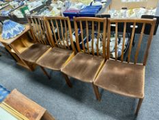 A set of four mid century teak G-Plan dining chairs