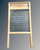 A pine and glass washboard.
