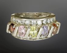 A silver dress ring set with gemstones including garnet, topaz etc,