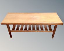 A 20th century teak coffee table with undershelf