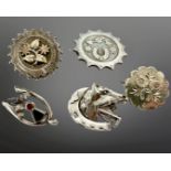 A group of five antique and later silver brooches including Scottish agate and bloodstone example,