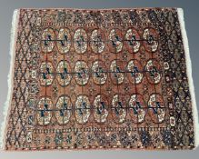 A Tekke rug, Afghanistan, 110cm by 135cm.