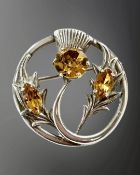 A Scottish silver and citrine thistle brooch, diameter 34mm.