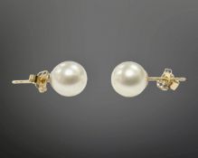 A pair of 18ct gold cultured pearl stud earrings, with post fittings, stamped 750.