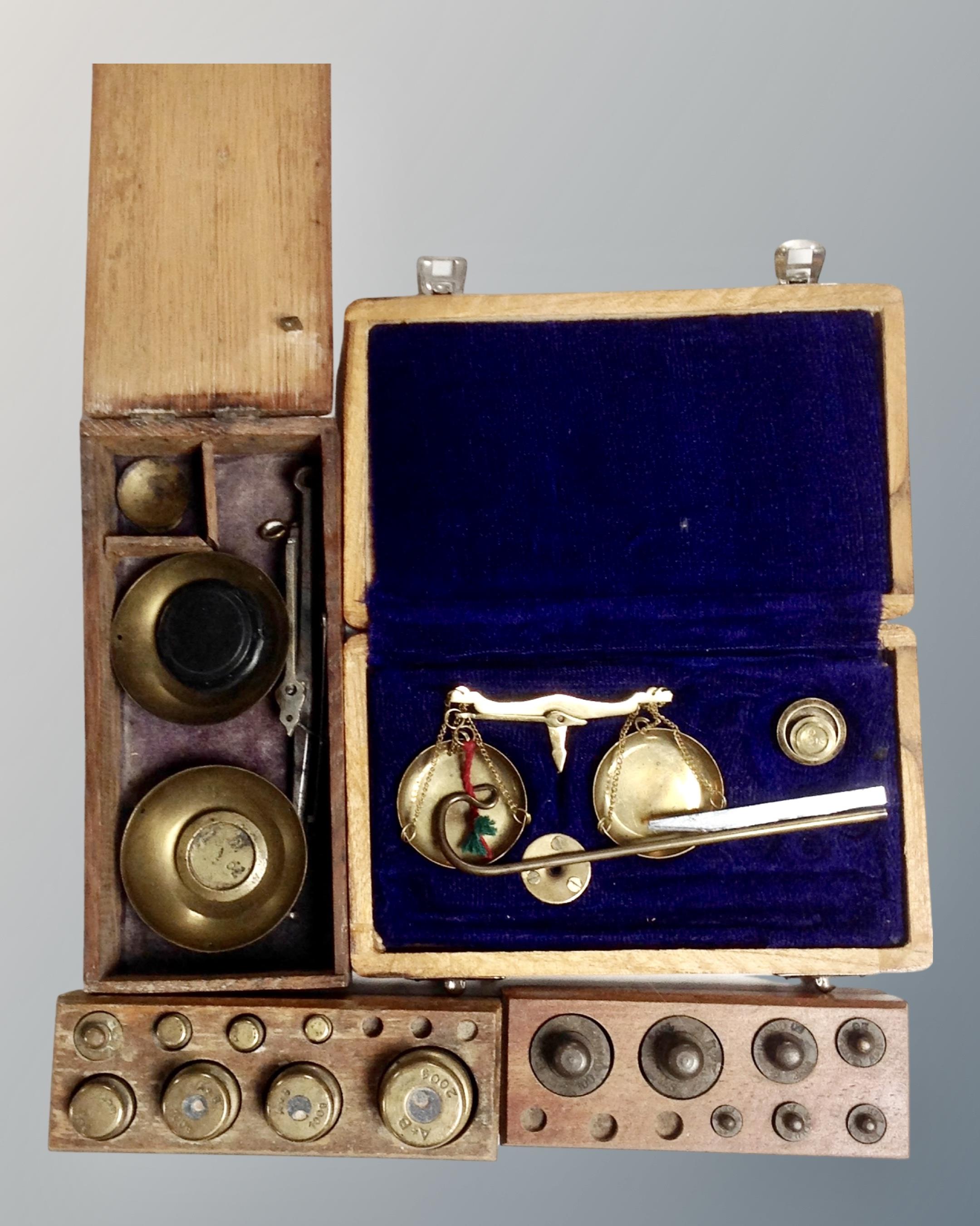 A collection of scales and brass weights