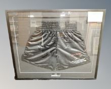 A pair of Leon Spinks signed boxing shorts, World Heavyweight Champion 1978, in frame and mount,