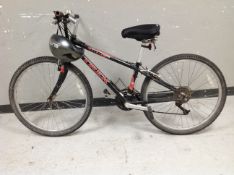 A Trek 800 Sport mountain bike with helmet.