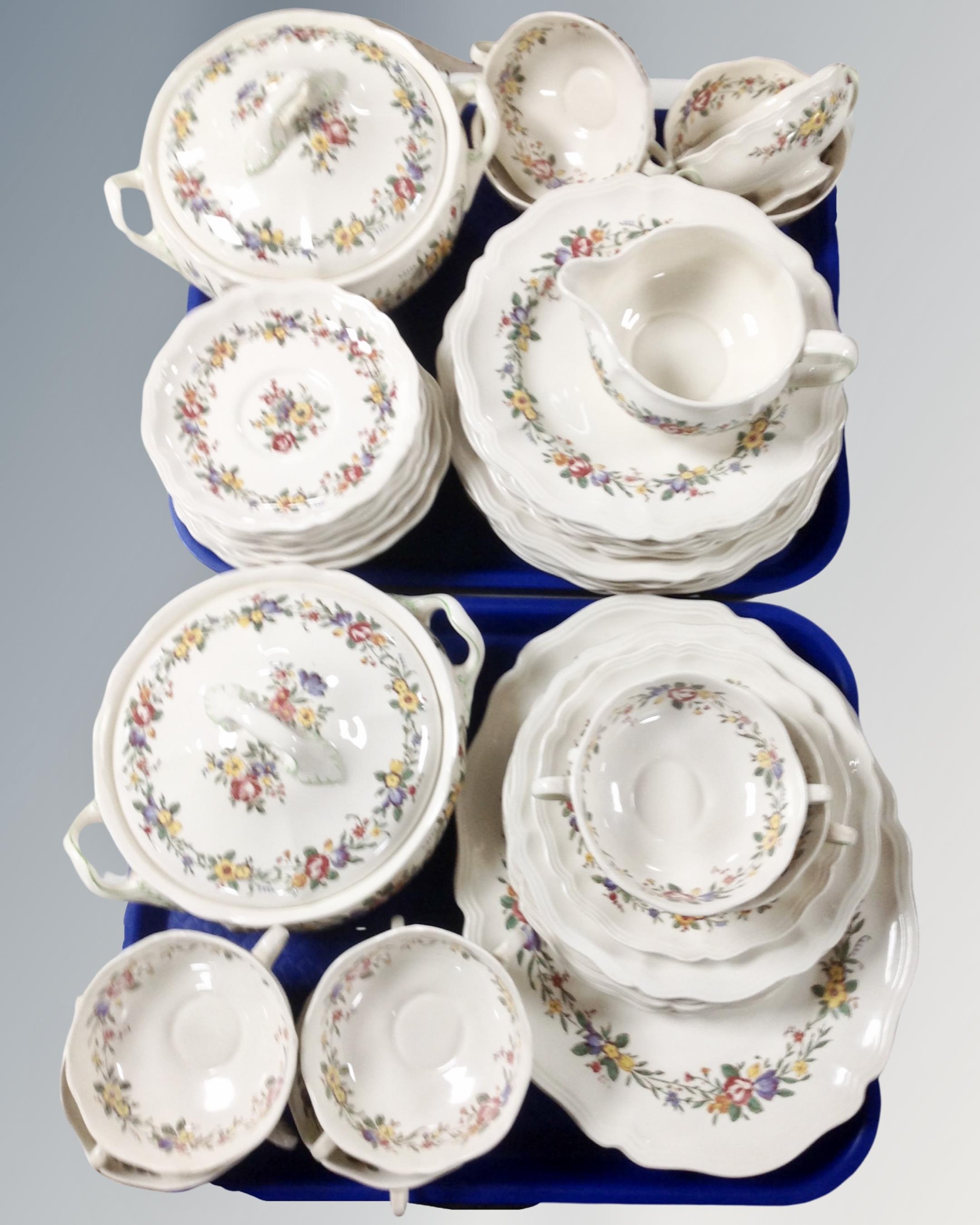 Two trays containing Royal Doulton Leighton tea and dinnerware.