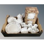 A box containing Mayfair pottery tea and dinner china.