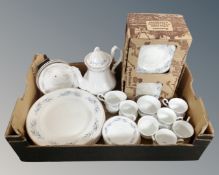 A box containing Mayfair pottery tea and dinner china.