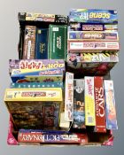 Two boxes of a quantity of board games to include Monopoly, Question of Sport,