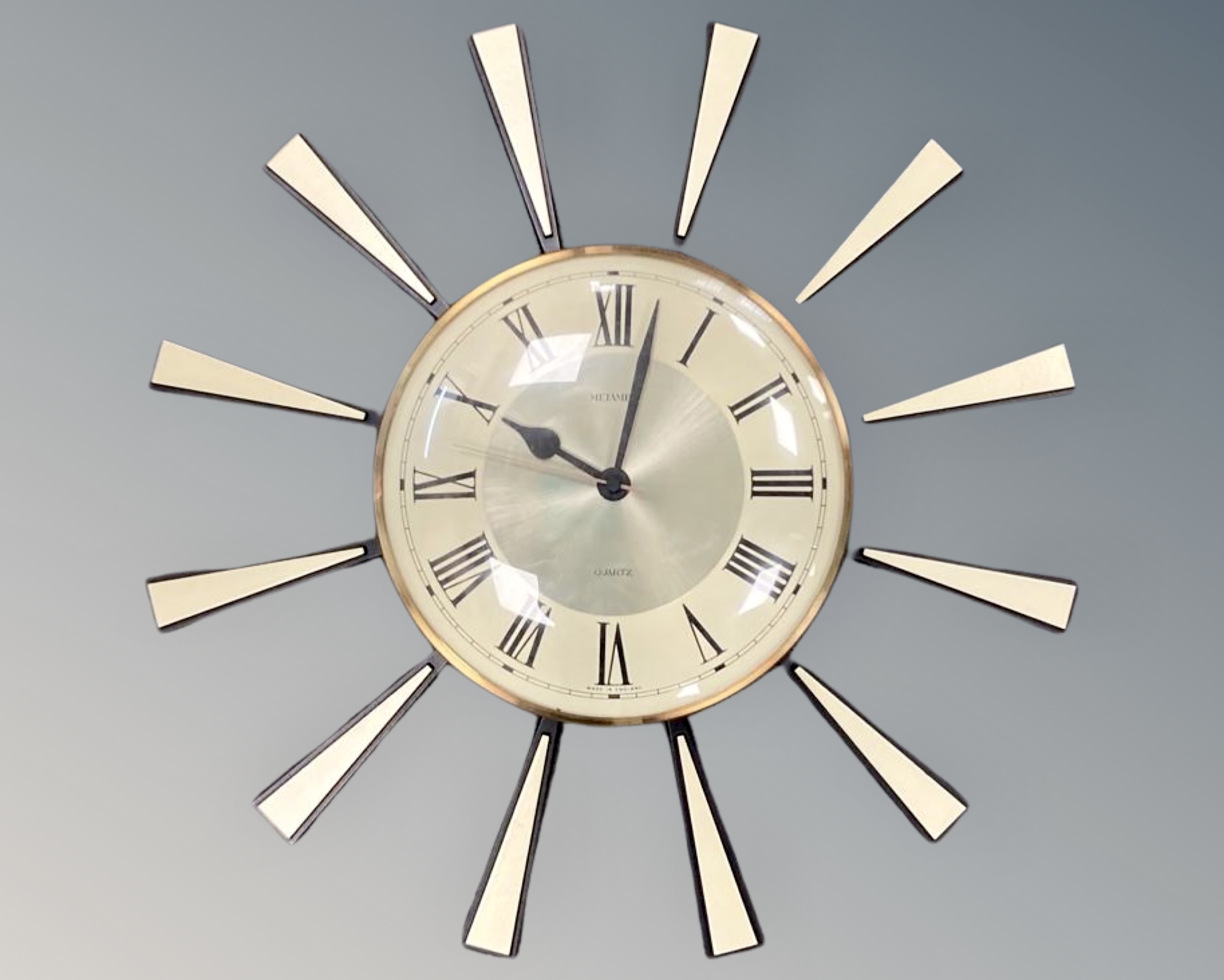 A Metamec Starburst wall clock